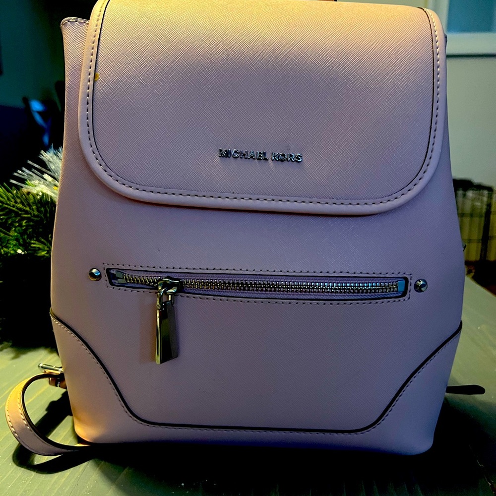 Michael Kors Back Pack. Medium size. Pale Pink. New , used a handful of times.